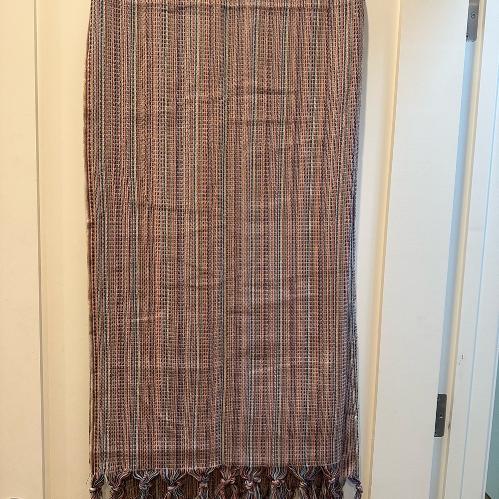 New, never used. Peruvian Hand made Reversible Cape wrap, delicate light weight.